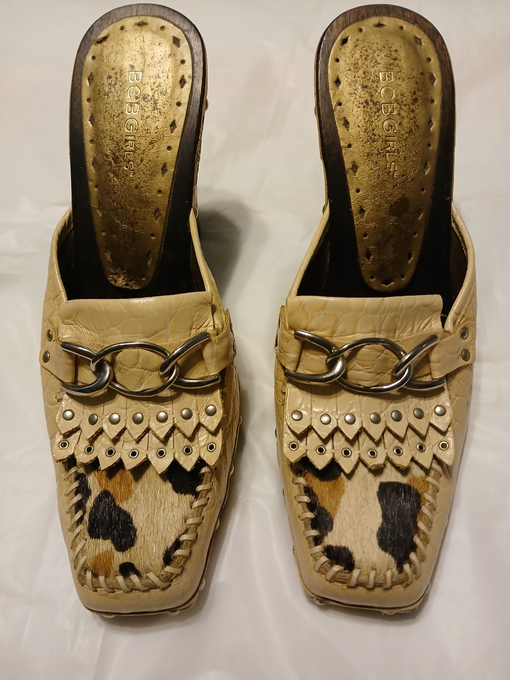 BCBGirls Cream Leather Slip-On Mules with Animal Print and Chain Detail